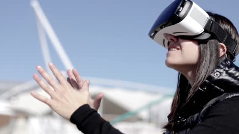 Smiling-woman-using-VR-headset-on-street